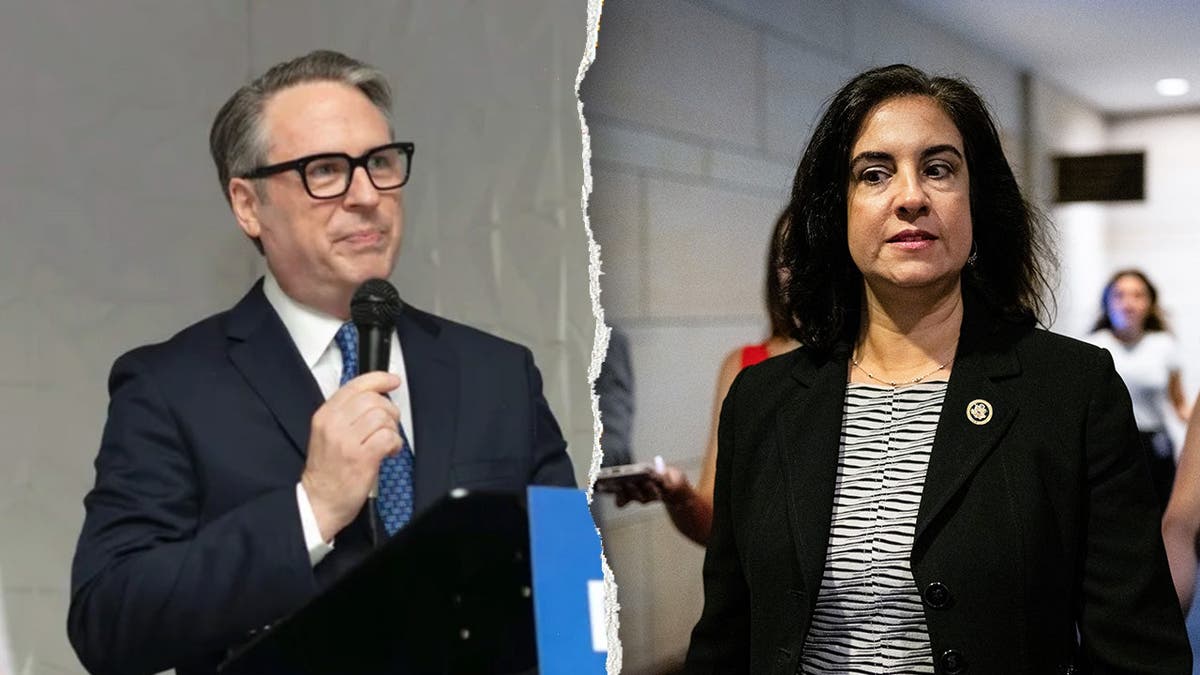 Michael DeCillis, left, pictured alongside Nicole Malliotakis, right