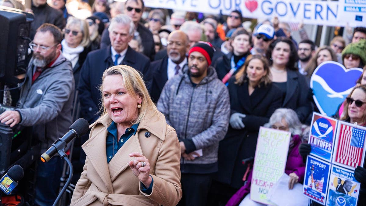 Rep. April McClain Delaney speaking at a rally outside NOAA headquarters in Silver Spring, Maryland