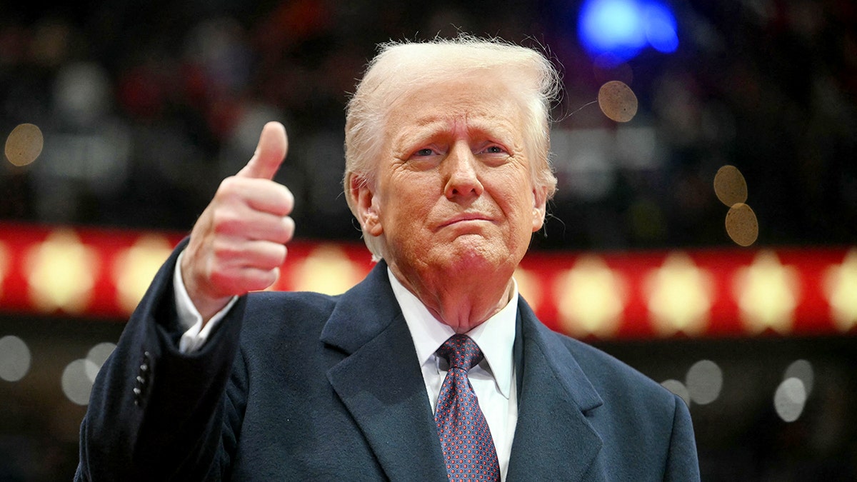 President Donald Trump speaking at a podium during an event.