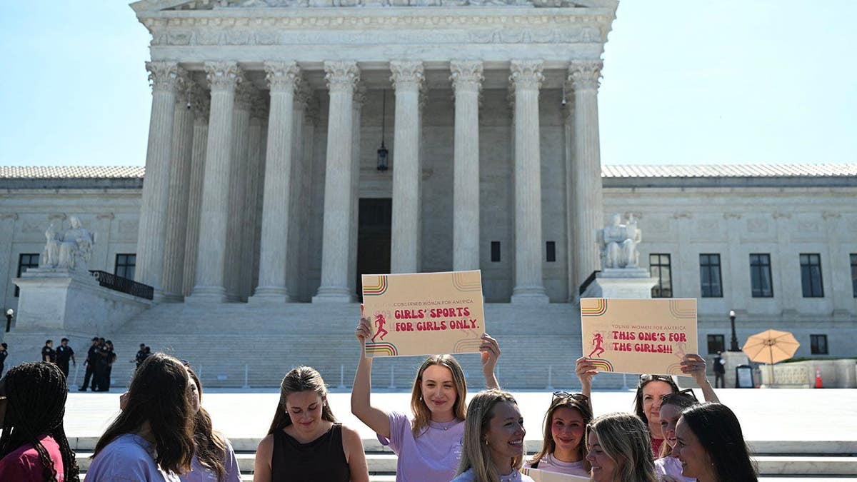 women demonstrate outside supreme court