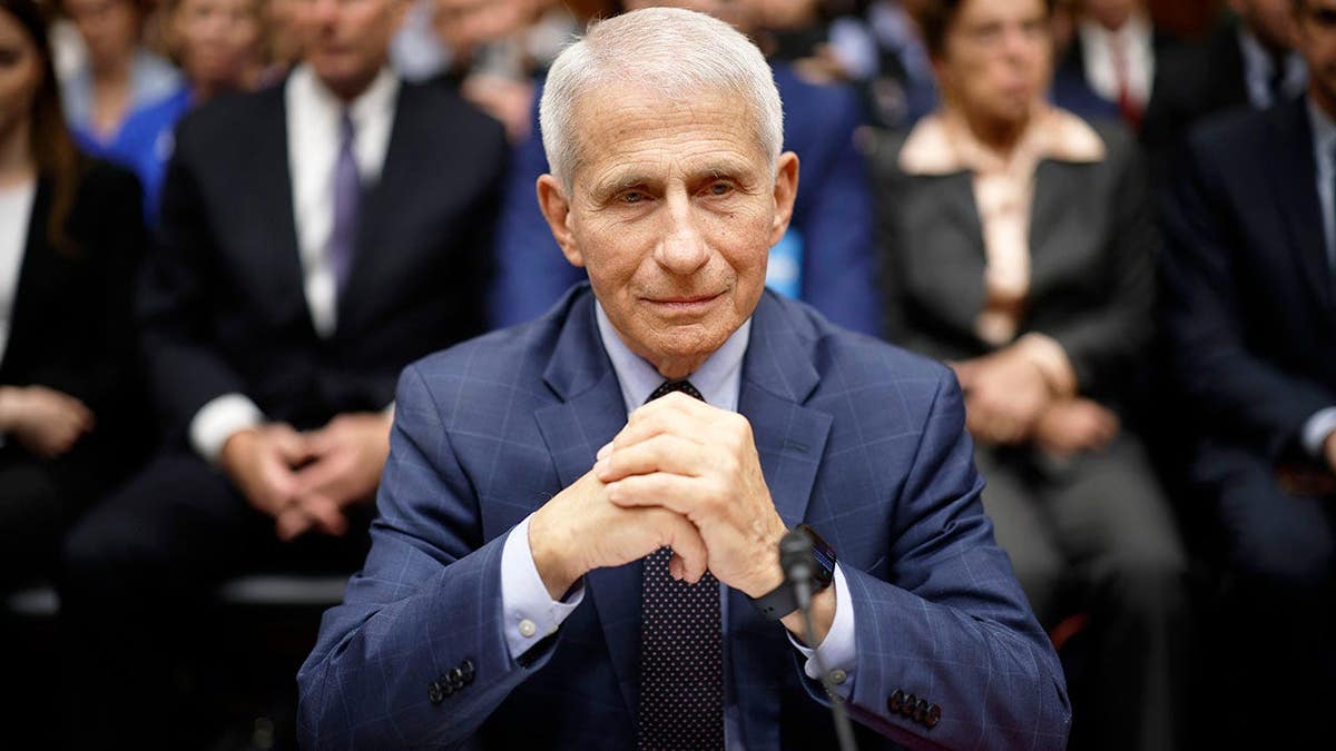 Dr. Anthony Fauci arrives at the Rayburn House Office Building to testify before a House committee.