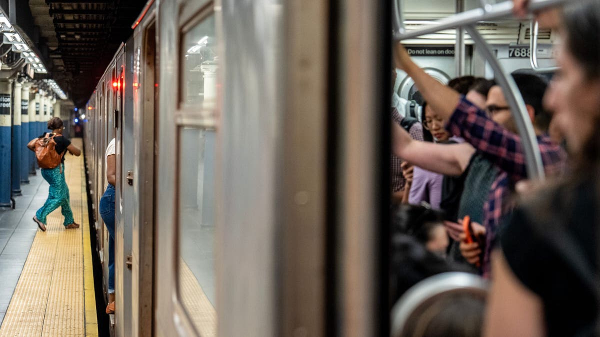 Commuters during the morning rush hour at the Fulton Center subway station in New York, US, on Tuesday, July 30, 2024.