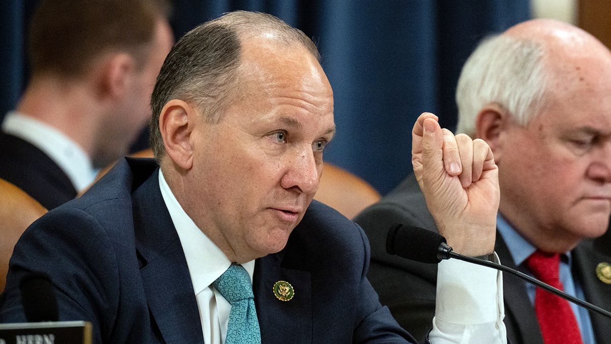 Lloyd Smucker and lawmakers in a hearing