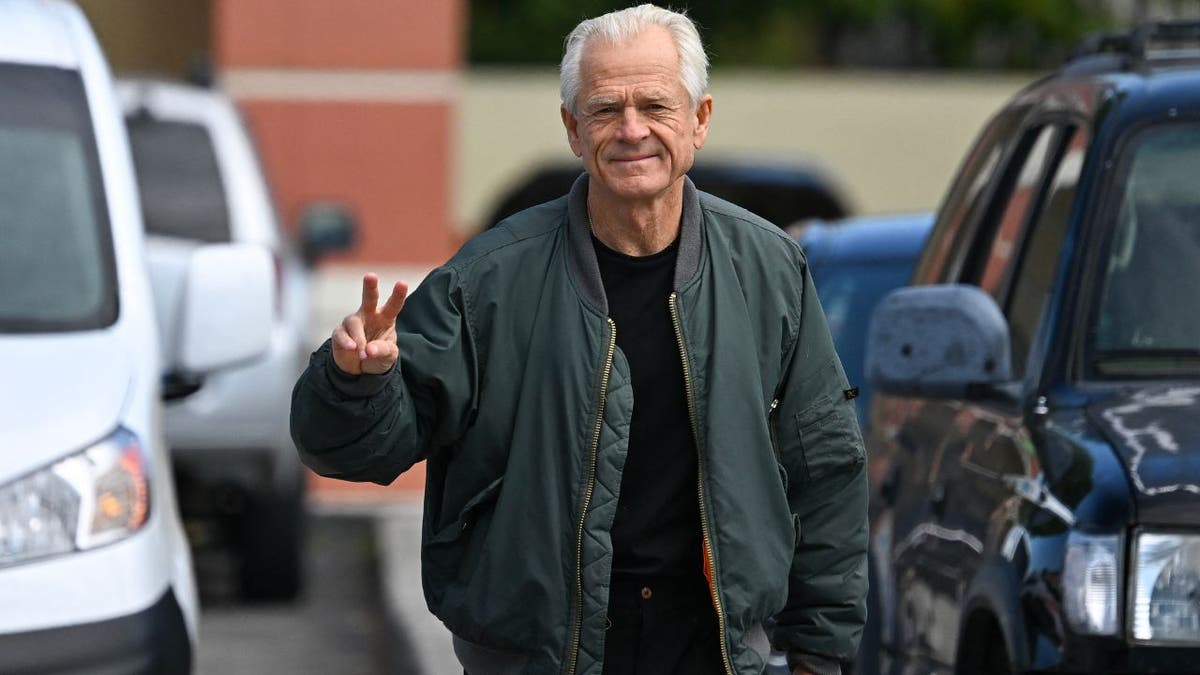 Peter Navarro, White House trade advisor to former US President Donald Trump, arrives to speak to the press at the Country Mall Plaza before reporting to the Federal Correctional Institution, in Miami, Florida on March 19, 2024.