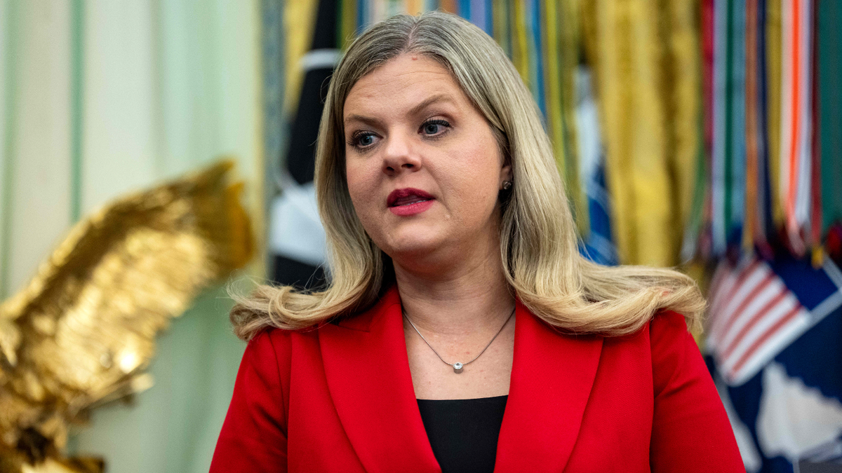 Heidi Overton stands in Oval office