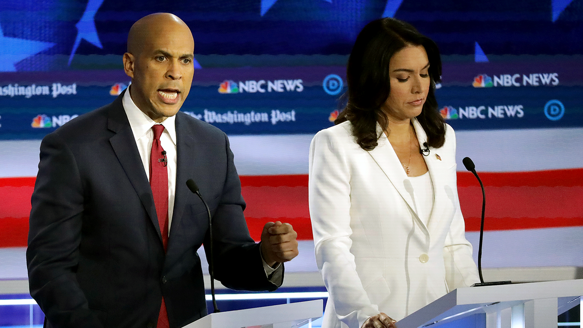 Cory Booker and Tulsi Gabbard in a 2020 democratic presidential primary debate