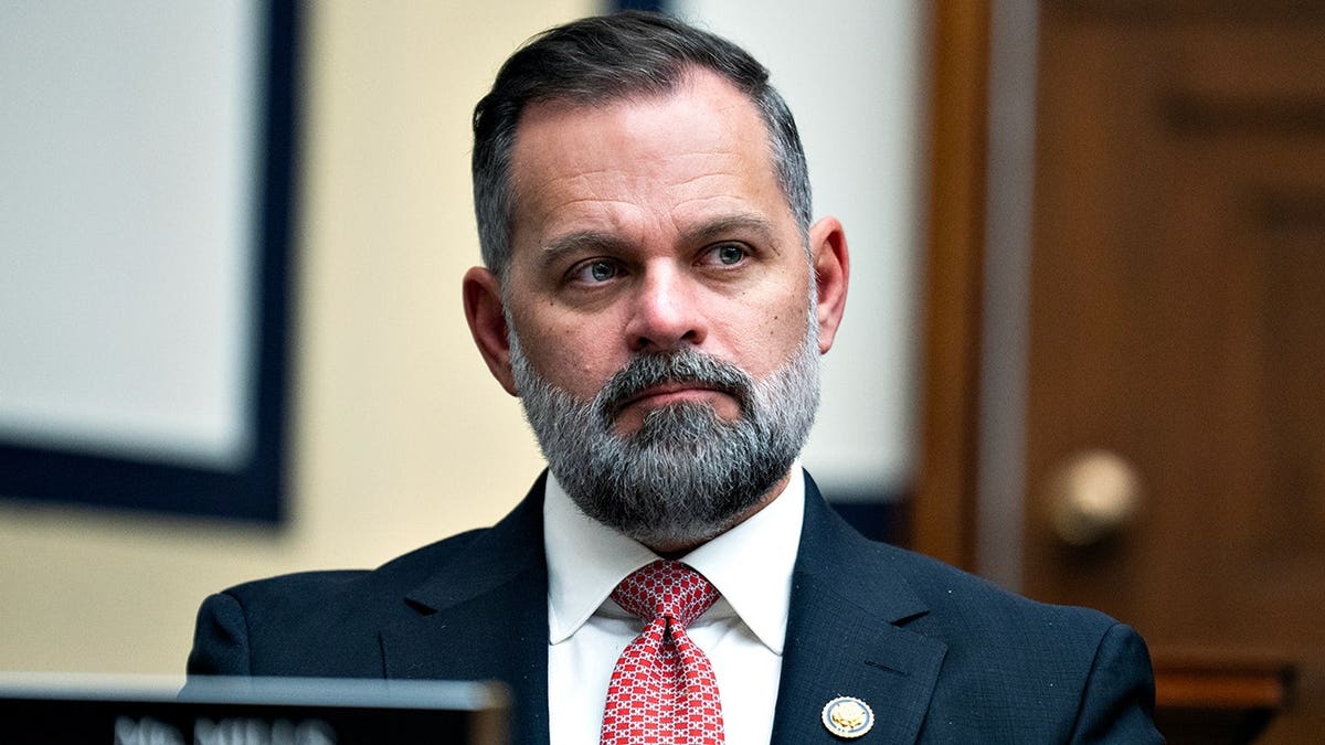 Rep. Cory Mills attends House Armed Services Committee hearing in Rayburn building.