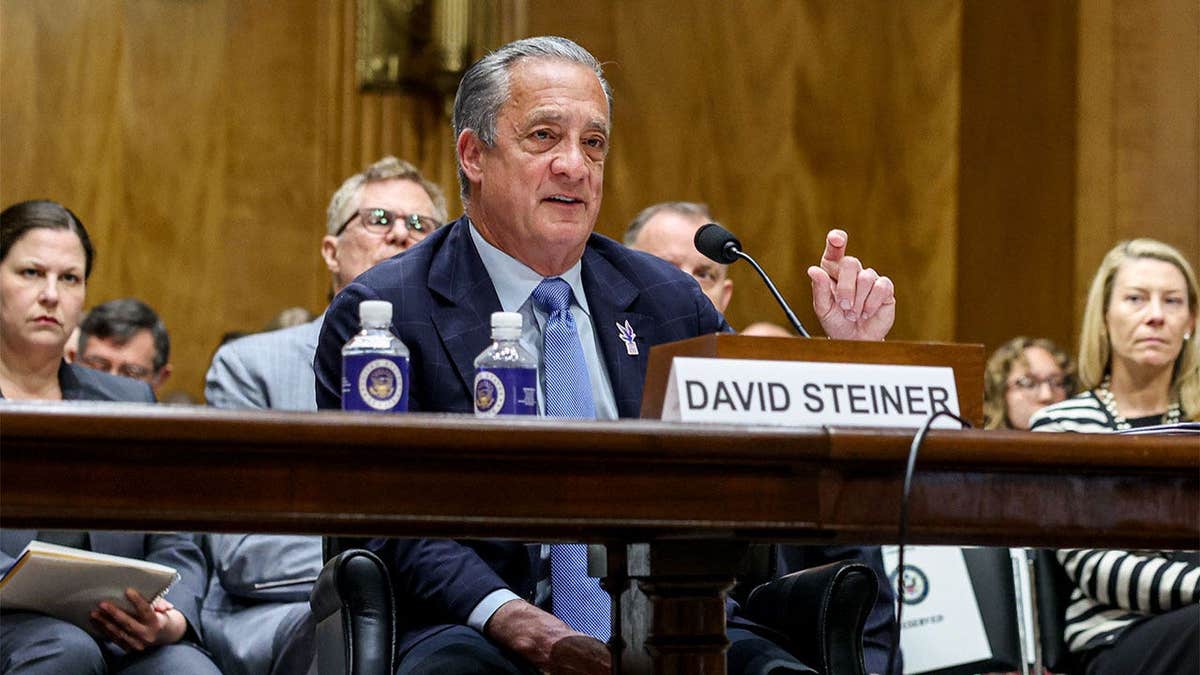 Postmaster General David Steiner testifies before a Senate committee during a hearing on USPS reforms