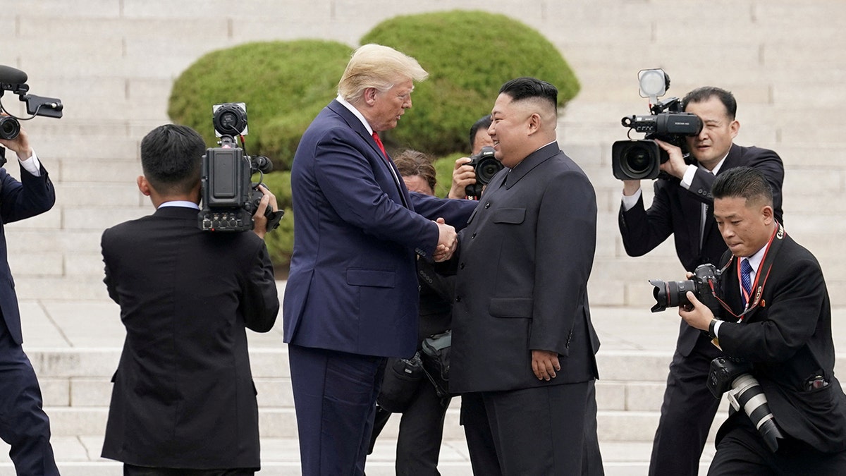 President Donald Trump meets with North Korean leader Kim Jong Un at the demilitarized zone separating the two Koreas, in Panmunjom, South Korea, June 30, 2019.