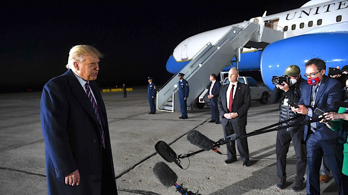 Donald Trump speaks to media on an airport tarmac, reacting to news of Jutice Ruth Bader Ginsburg's death.