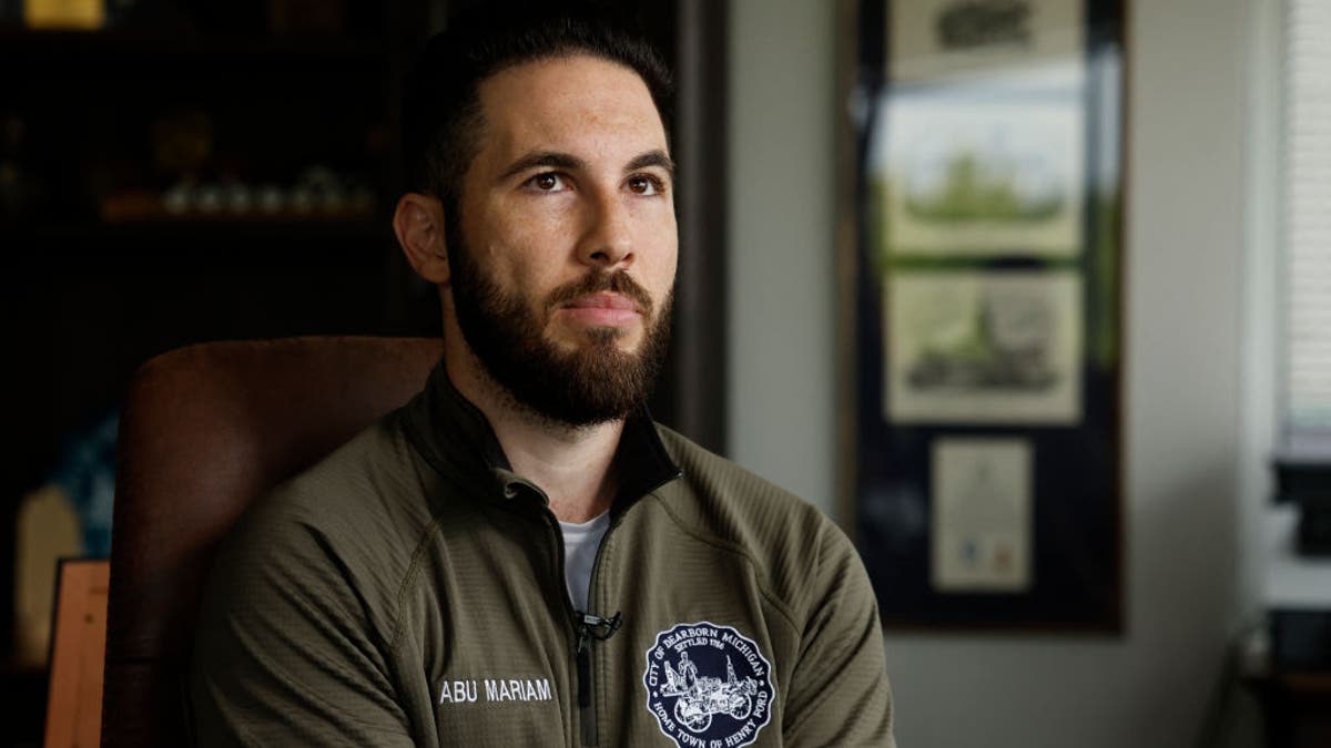 Dearborn Mayor Abdullah H. Hammoud poses for a portrait in his office in Dearborn, Michigan on June 18, 2024. Hammoud's election as the first Muslim mayor of automaking hub Dearborn two years ago was a watershed moment for this city that is home to the highest concentration of Arab-Americans in the United States. But while his early time in office was focused on upgrading the sewage system and investing in parks, he's been thrust into the national spotlight for his outspoken criticism of US President Joe Biden's support for Israel's military offensive in Gaza. (Photo by JEFF KOWALSKY / AFP) (Photo by JEFF KOWALSKY/AFP via Getty Images)