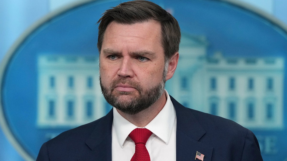 Vice President JD Vance listens during press briefing
