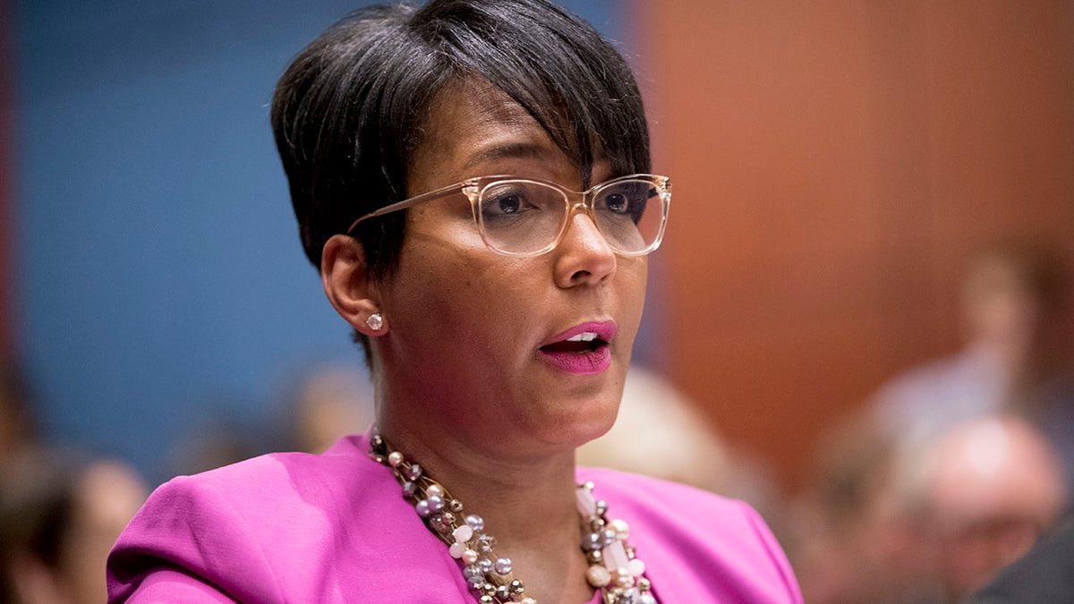FILE - In this July 17, 2019 file photo shows Atlanta Mayor Keisha Lance Bottoms speaks during a Senate Democrats' Special Committee on the Climate Crisis on Capitol Hill in Washington. Georgia officials are investigating a racist text received by the Atlanta mayor. Attorney General Chris Carr directed his office’s prosecution division to investigate who sent the text, spokeswoman Katie Byrd said Friday, April 24, 2020. (AP Photo/Andrew Harnik)