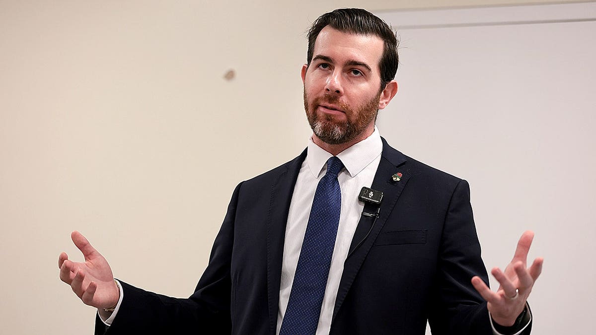 Oliver Larkin speaks at an emergency town hall about congressional redistricting in Coral Springs, Fla.