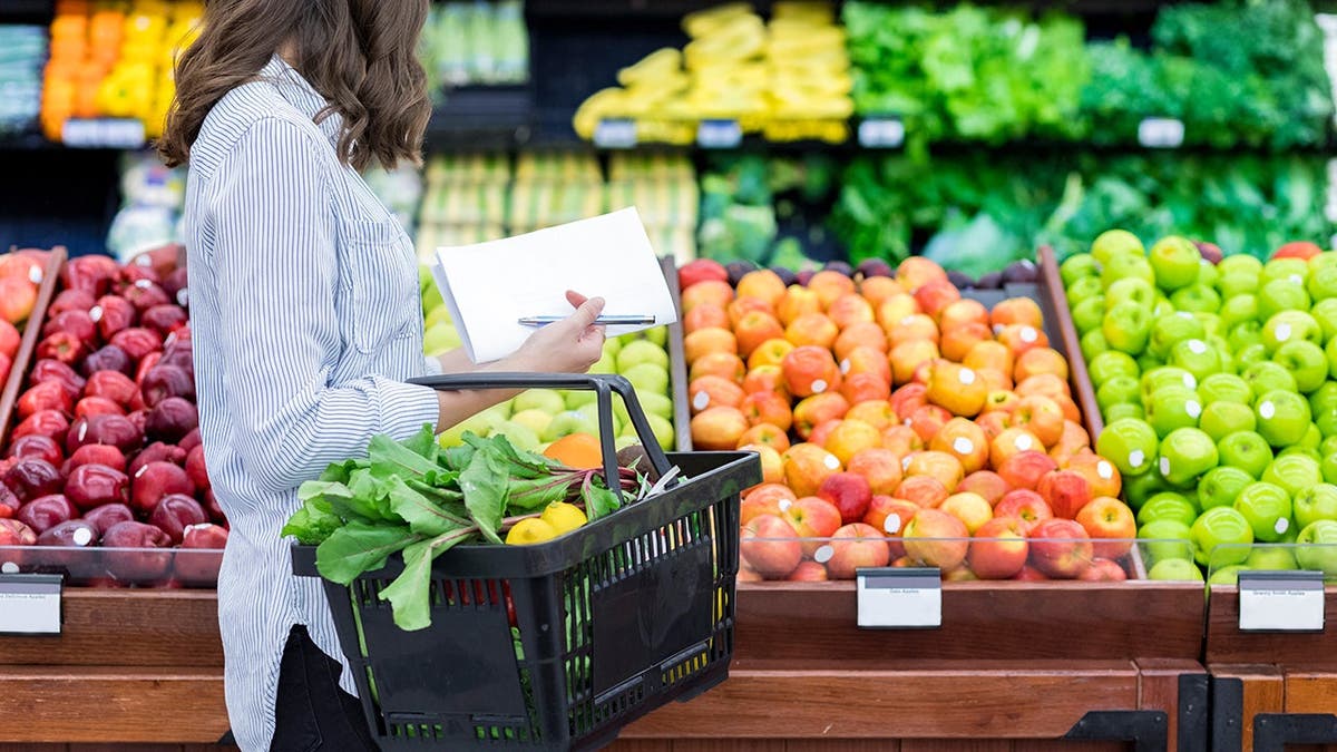 A woman shops at the grocery store.