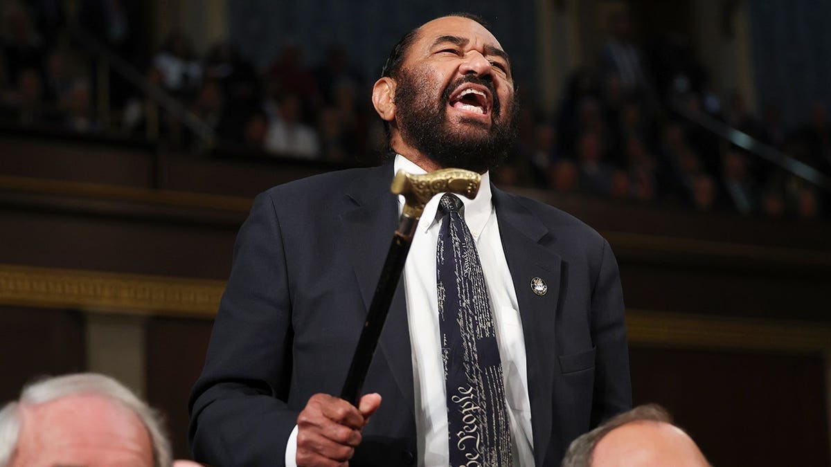 Rep. Al Green shouts at President Trump as the president addressed a joint session of Congress in March 2025