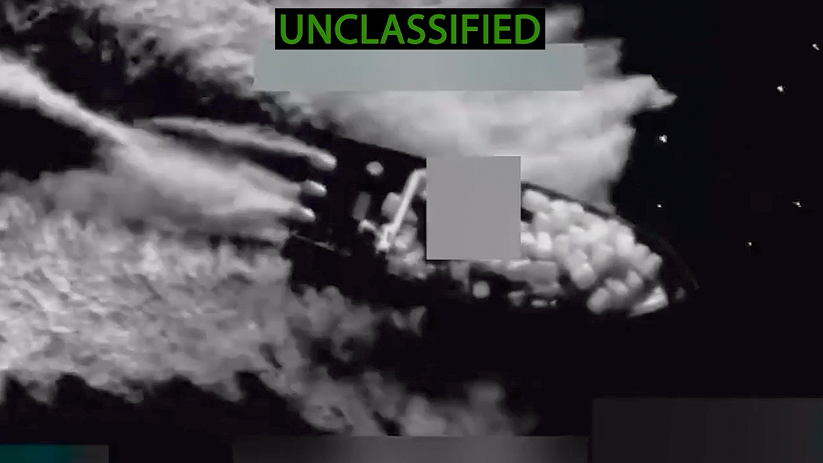 Unclassified aerial image shows a boat carrying numerous packages on the water on Oct. 27, 2025