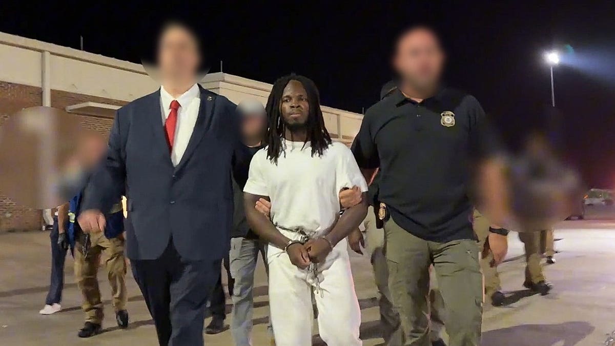 Wisteguens Jean Quely Charles during ICE arrest