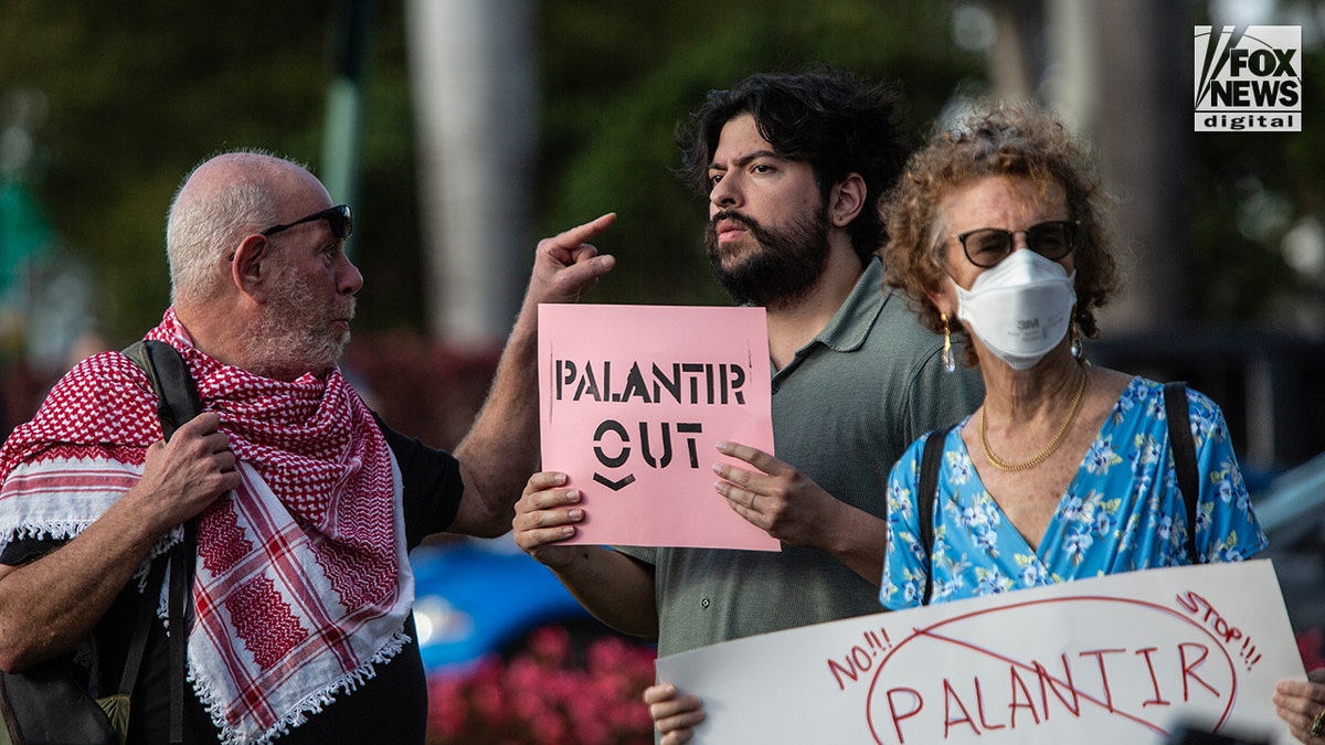 Activists gathered outside the Palantir headquarters in the Aventura area of Miami, Florida, during a demonstration.
