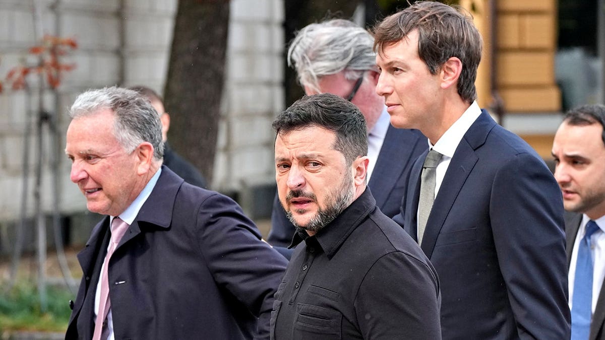 Volodymyr Zelenskyy walks with Jared Kushner and Steve Witkoff in Kyiv.
