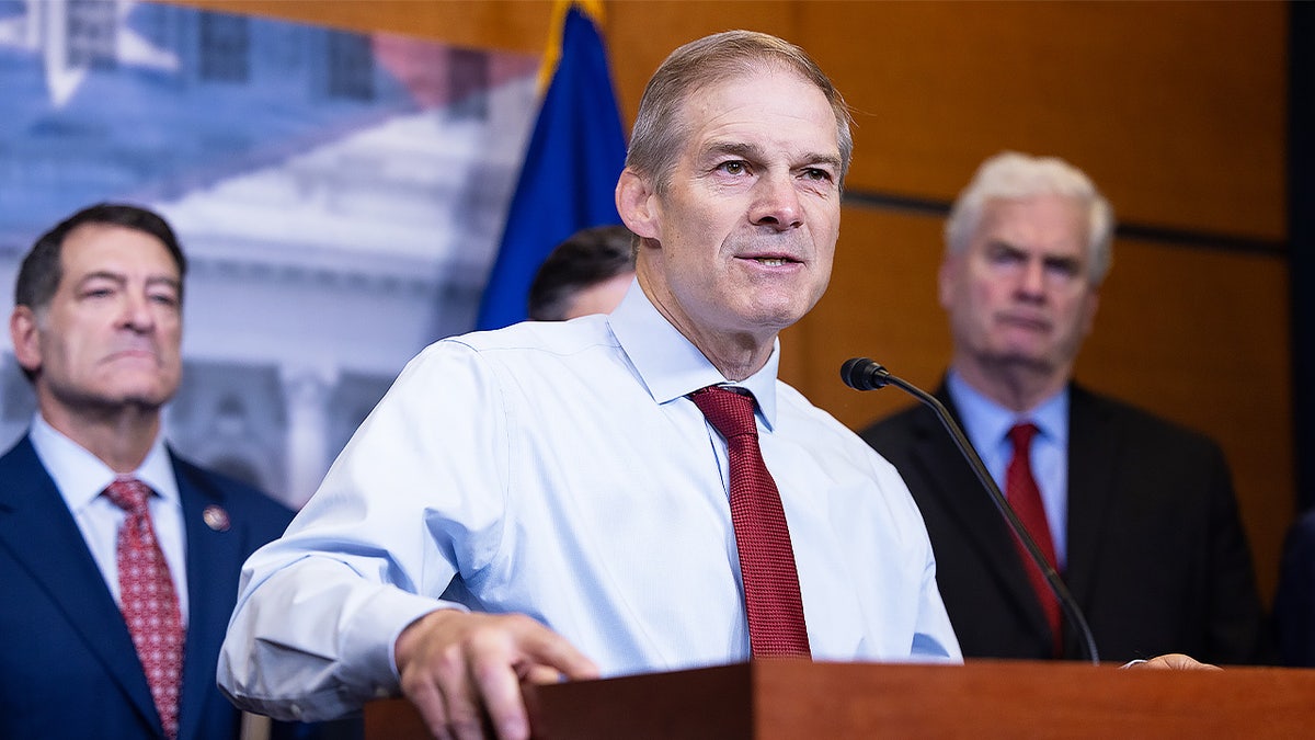 Jim Jordan standing at a podium