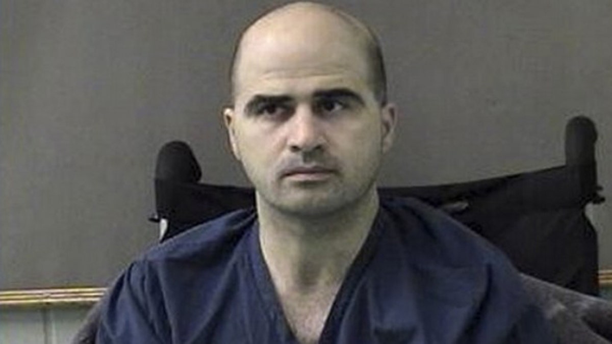 This April 9, 2010, file photo released by the Bell County Sheriffs Department shows Maj. Nidal Hasan at the Bell County Jail in Belton, Texas.