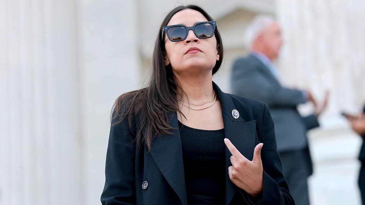 Rep. Alexandria Ocasio-Cortez wearing sunglasses