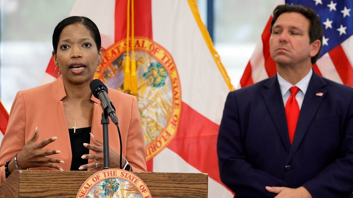 Shevaun Harris and Ron DeSantis
