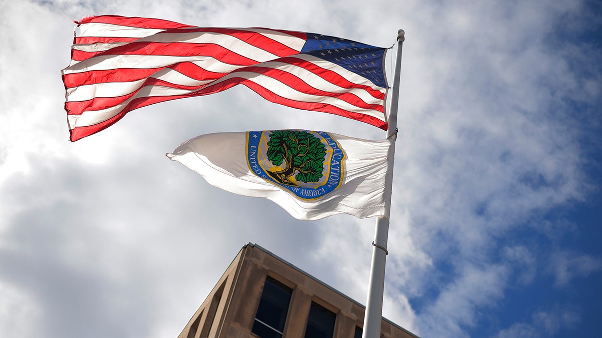 American flag and Education Department flags