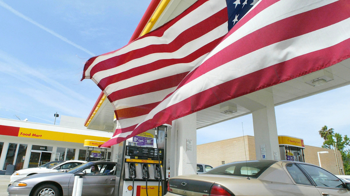 An American flag flies over a Shell station in Glendale California.