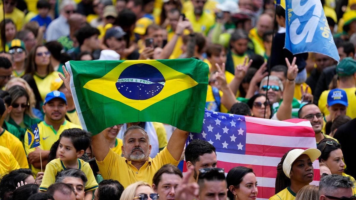 Brazil and U.S. flag present at a campaign rally for Flavio Bolsonaro.