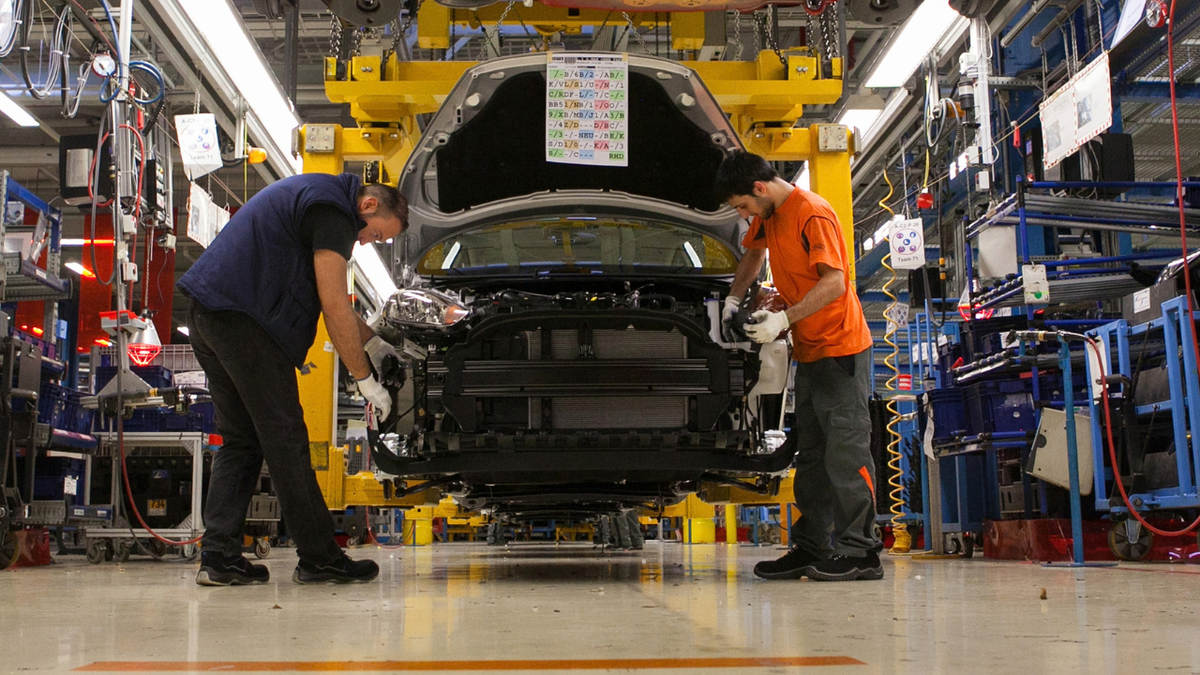 Car assembly line in a Michigan factory.