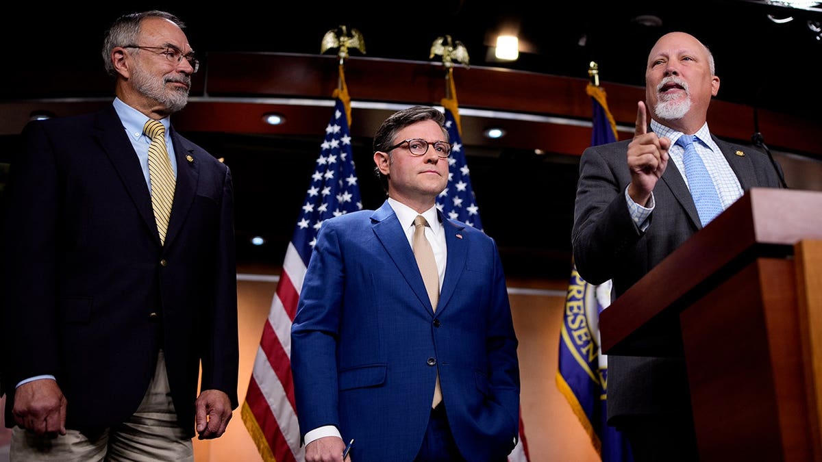 Rep. Chip Roy speaks at a Capitol Hill news conference with Rep. Andy Harris and Speaker Mike Johnson.