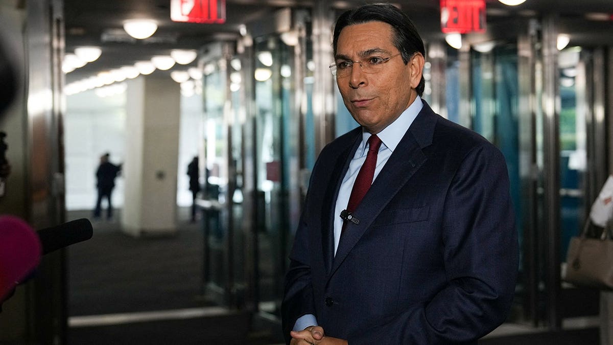 Danny Danon speaks to reporters at UN headquarters in New York City.