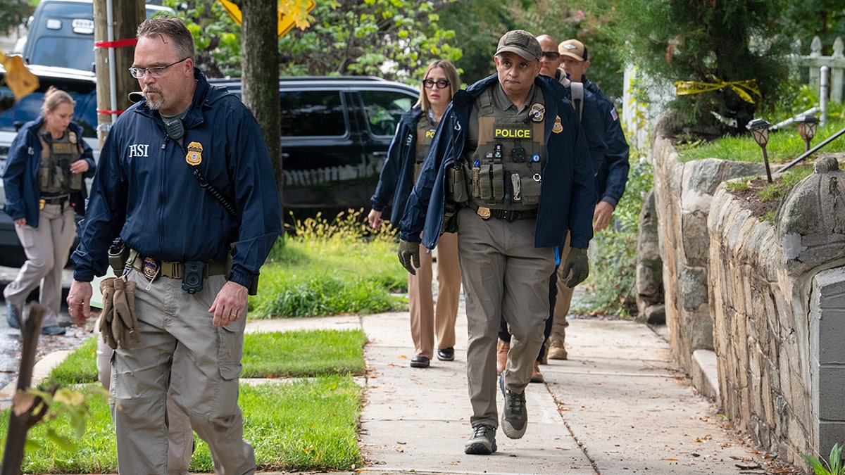 Homeland Security Investigations police search the home of Rep. Ilhan Omar (D-MN) on October 12, 2026 in Washington, DC.