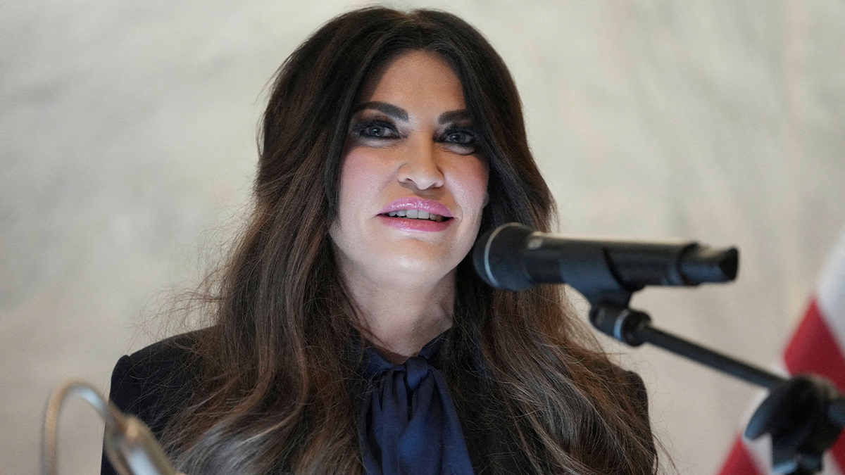U.S. Ambassador to Greece Kimberly Guilfoyle speaks into a microphone
