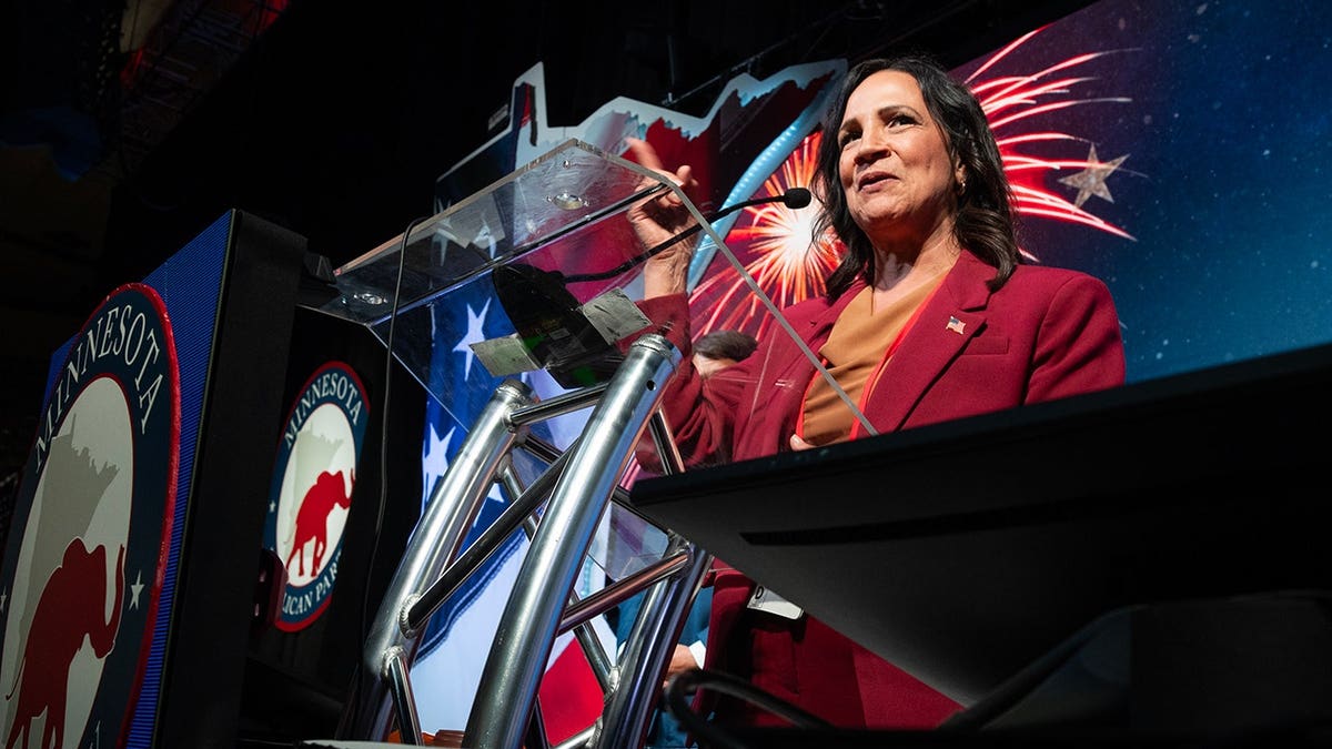 Lisa Demuth speaks at a podium during the Minnesota Republican state convention.