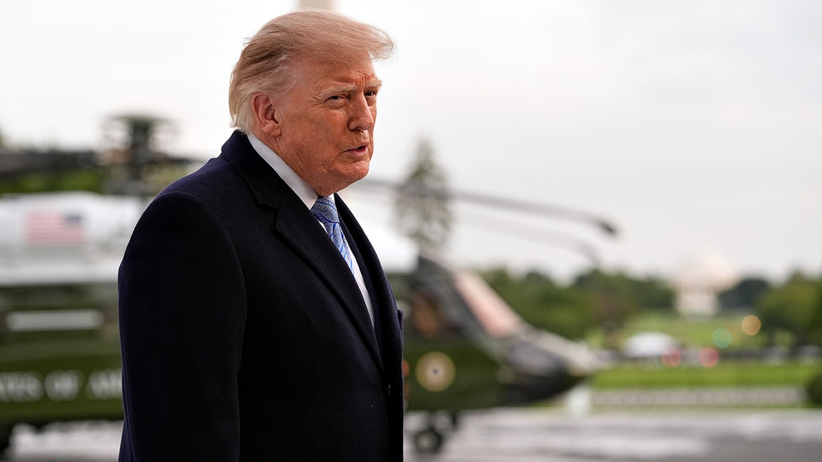 Donald Trump speaks to reporters