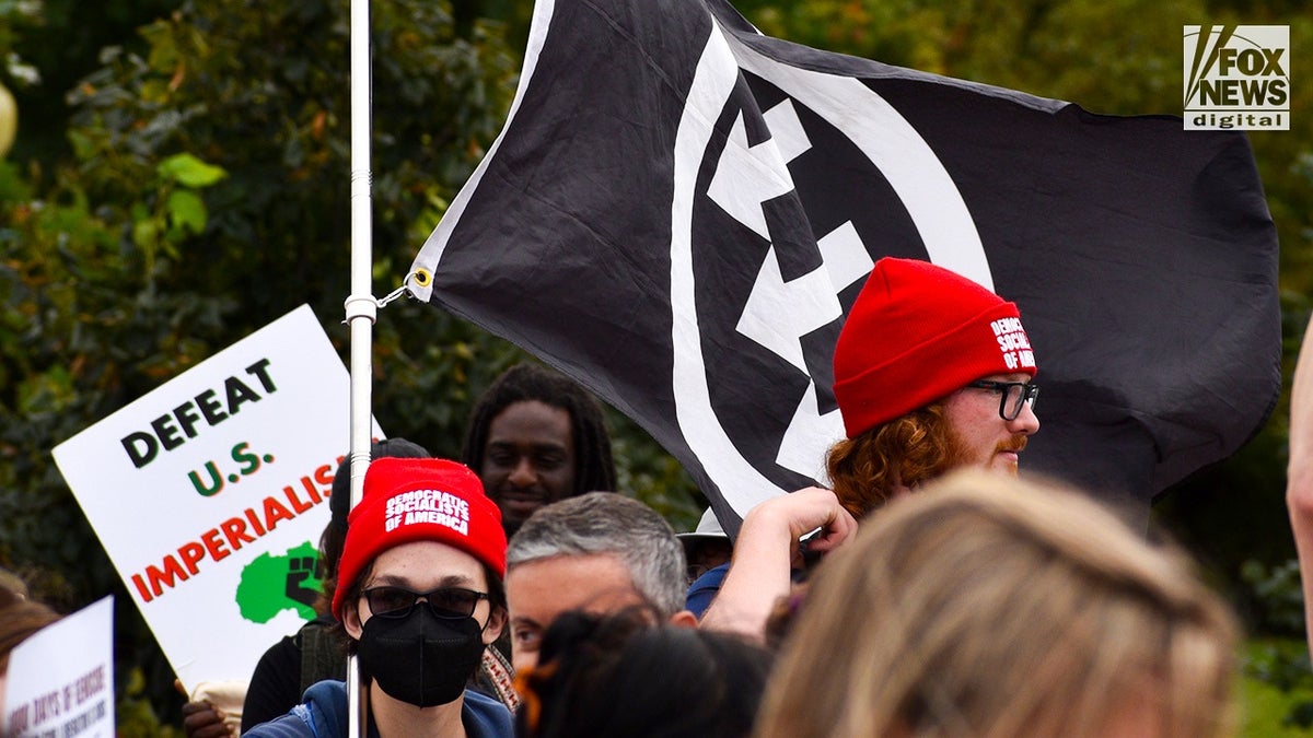 Antifa flag at a Pro-Palestine rally with members of the DSA.