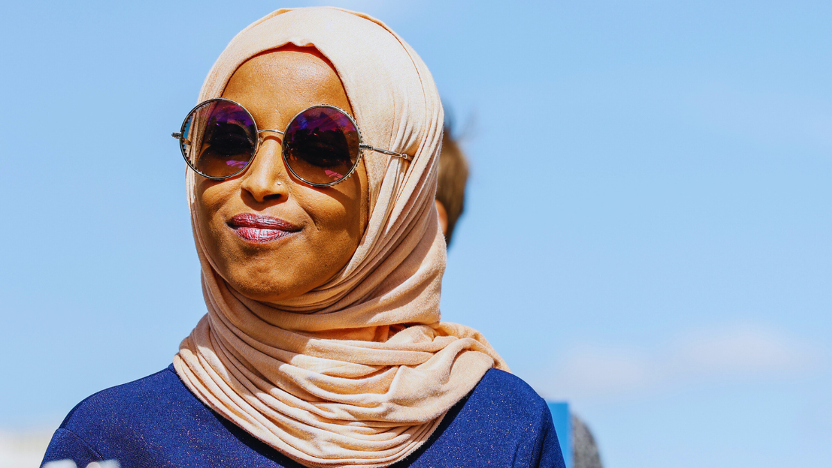 Rep. Ilhan Omar (D-MN) listens to a press conference outside of the U.S. Capitol building in 2022.