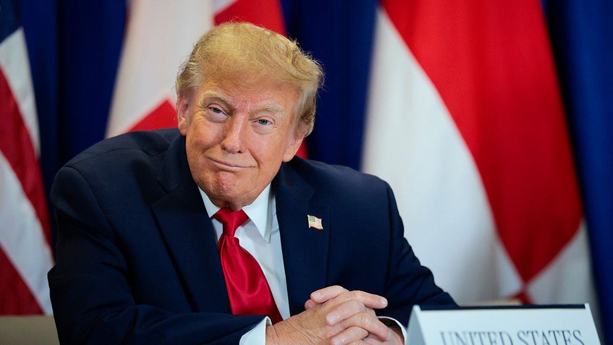 President Donald Trump looks on during a security pact signing ceremony at U.N. Headquarters.