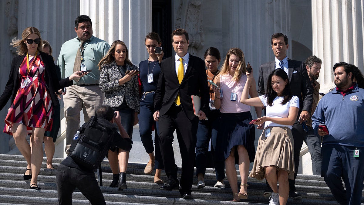 Gaetz swarmed by media on Capitol steps