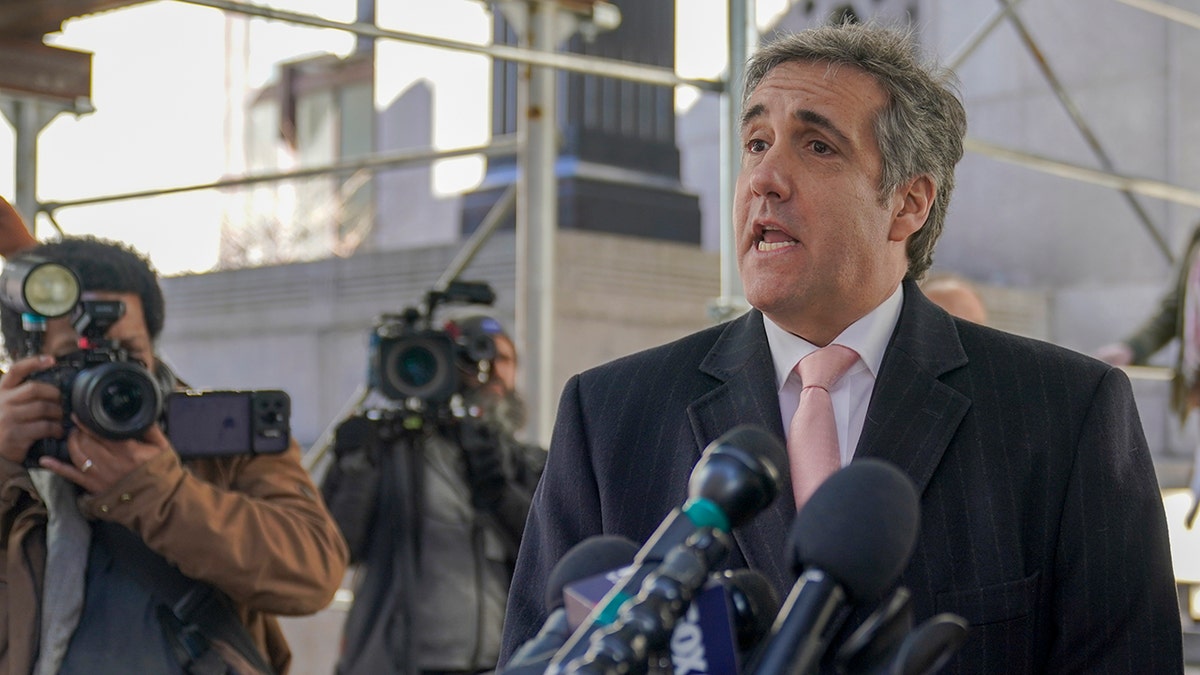Michael Cohen speaks at press gaggle