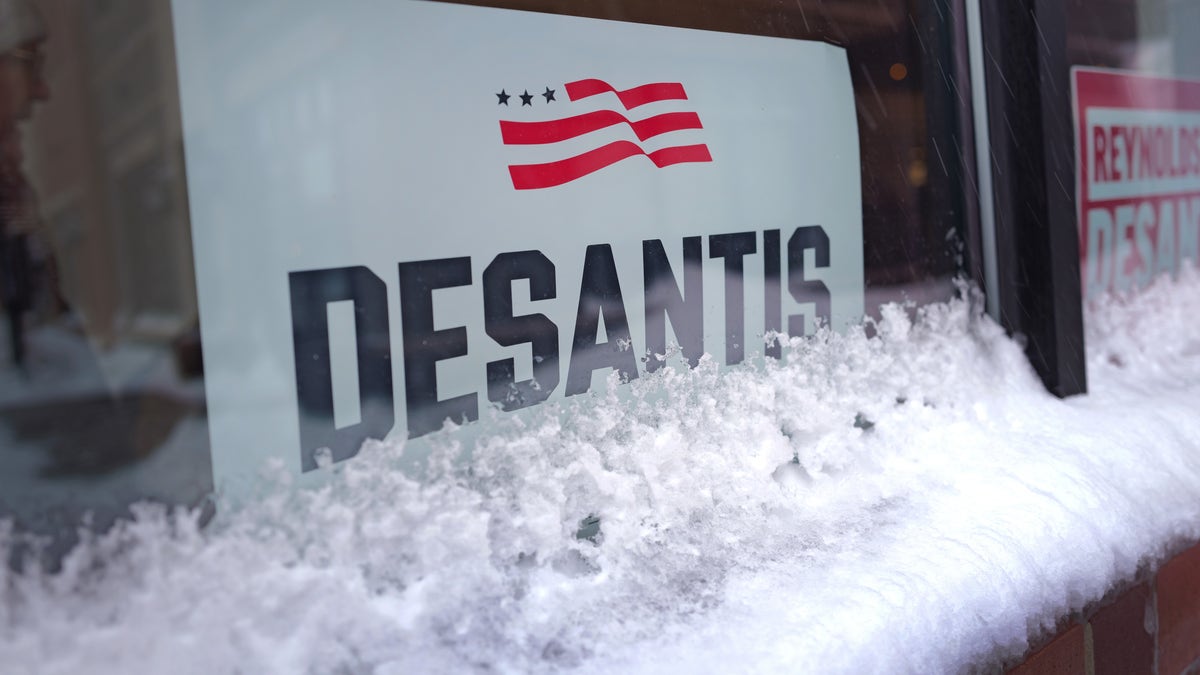 A campaign sign sits in the window for Ron DeSantis