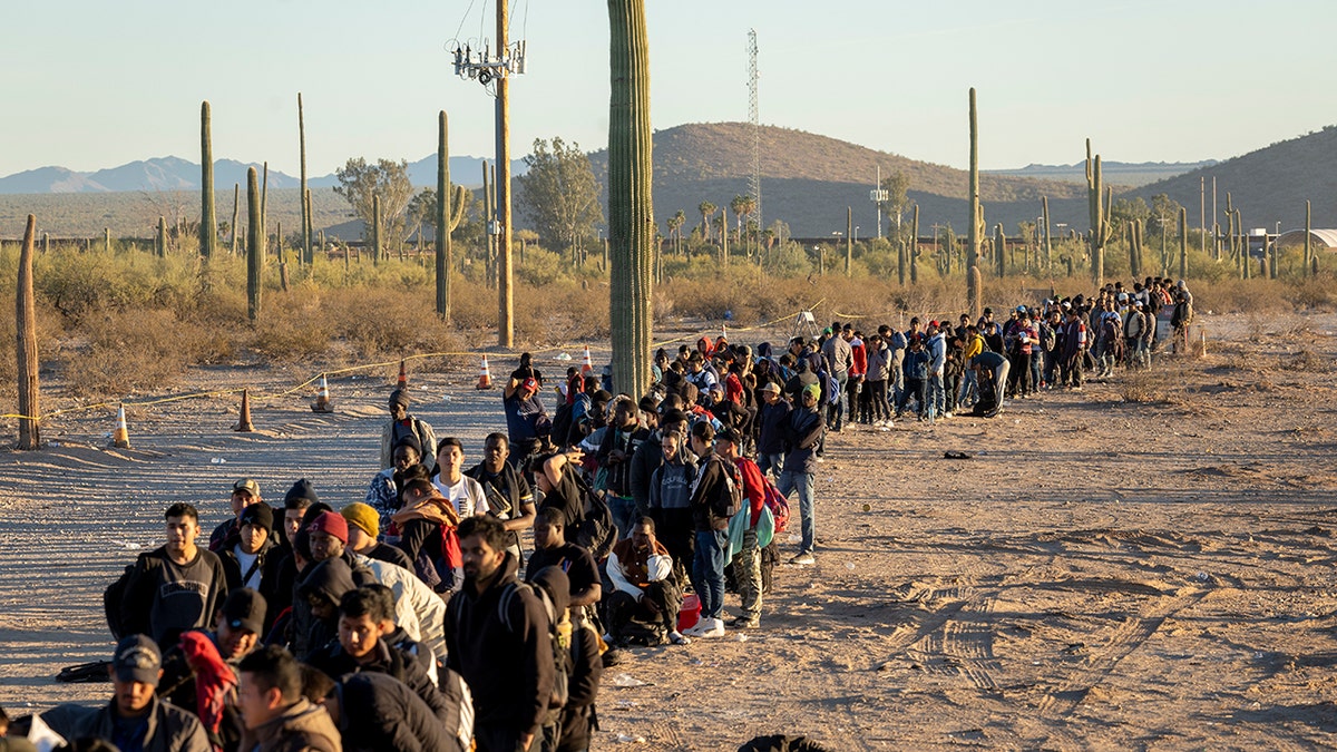 Migrants in a line