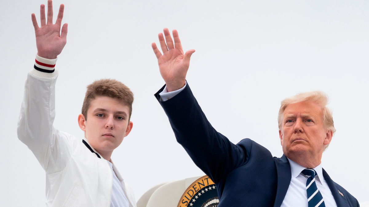Donald Trump and Barron Trump waving